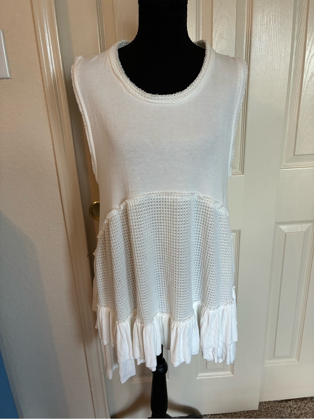 POL White Sleeveless Knit Peplum Tunic